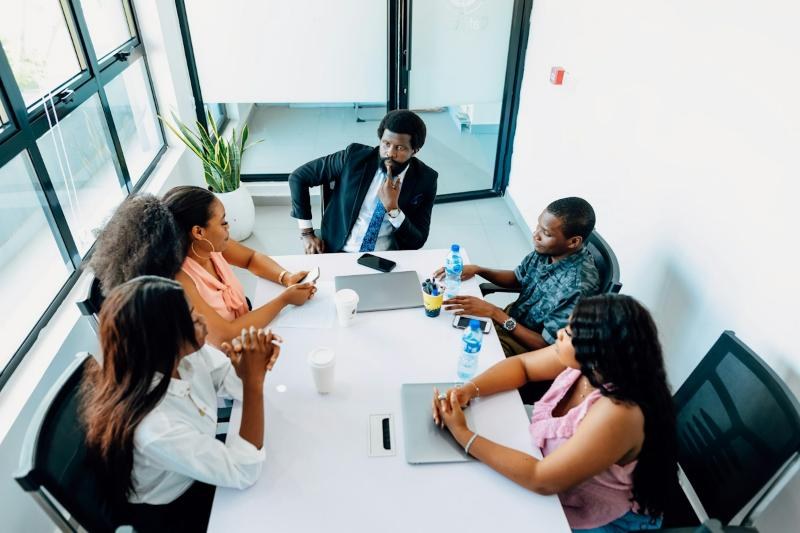 Advisory team meeting around a table